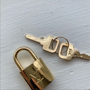 Authentic Louis Vuitton padlock with 1 key